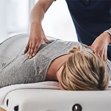 Chiropractic Glendale CA Woman Receiving Adjustment