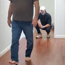 Chiropractor Glendale CA Alen Heshmat Watching Patient Walk